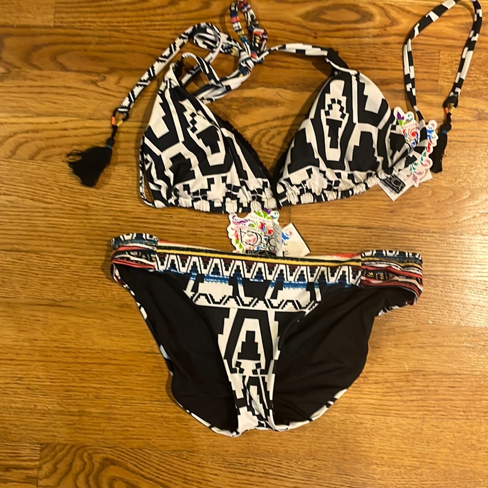 Brand New Becca bikini.  D cup top.  Medium bottom